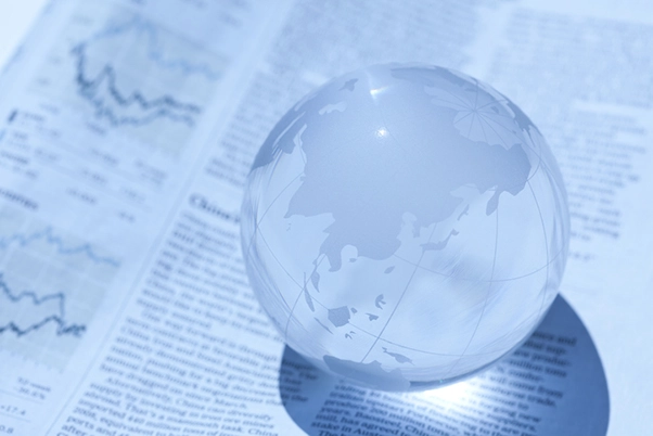 Illustration of a glass globe with news articles inside